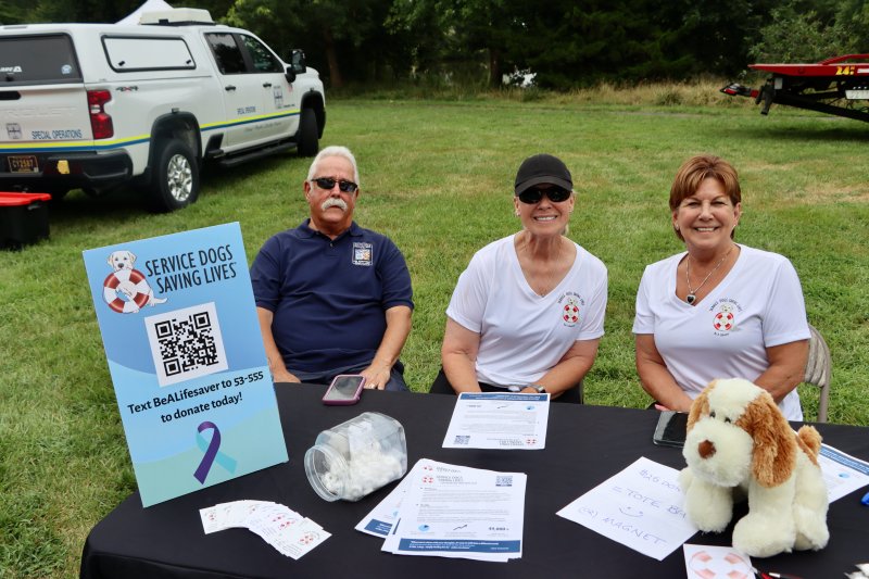 Shown are (l-r) Andy Hickey, Mary Hickey and Diana Tydings of Service Dogs Saving Lives.